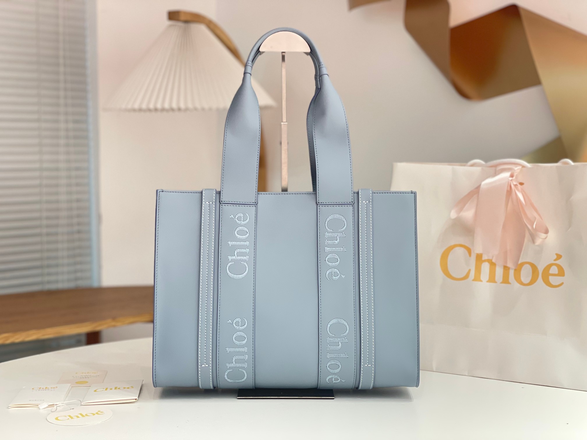 Chloe Medium Woody Tote Bag In Light Blue Soft Smooth Calfskin Leather